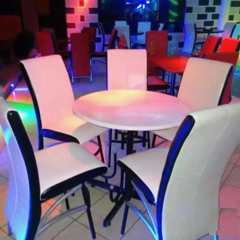 Restaurant Round Table With 5 Executive white Chairs Nairobi
